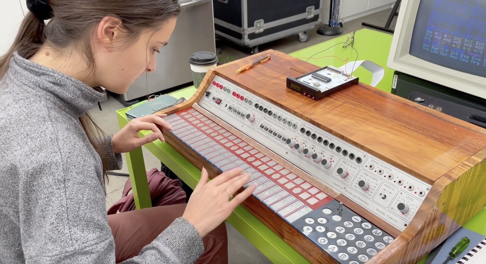 Sarah Belle Reid at the Buchla 400; image via the Buchla Archives.