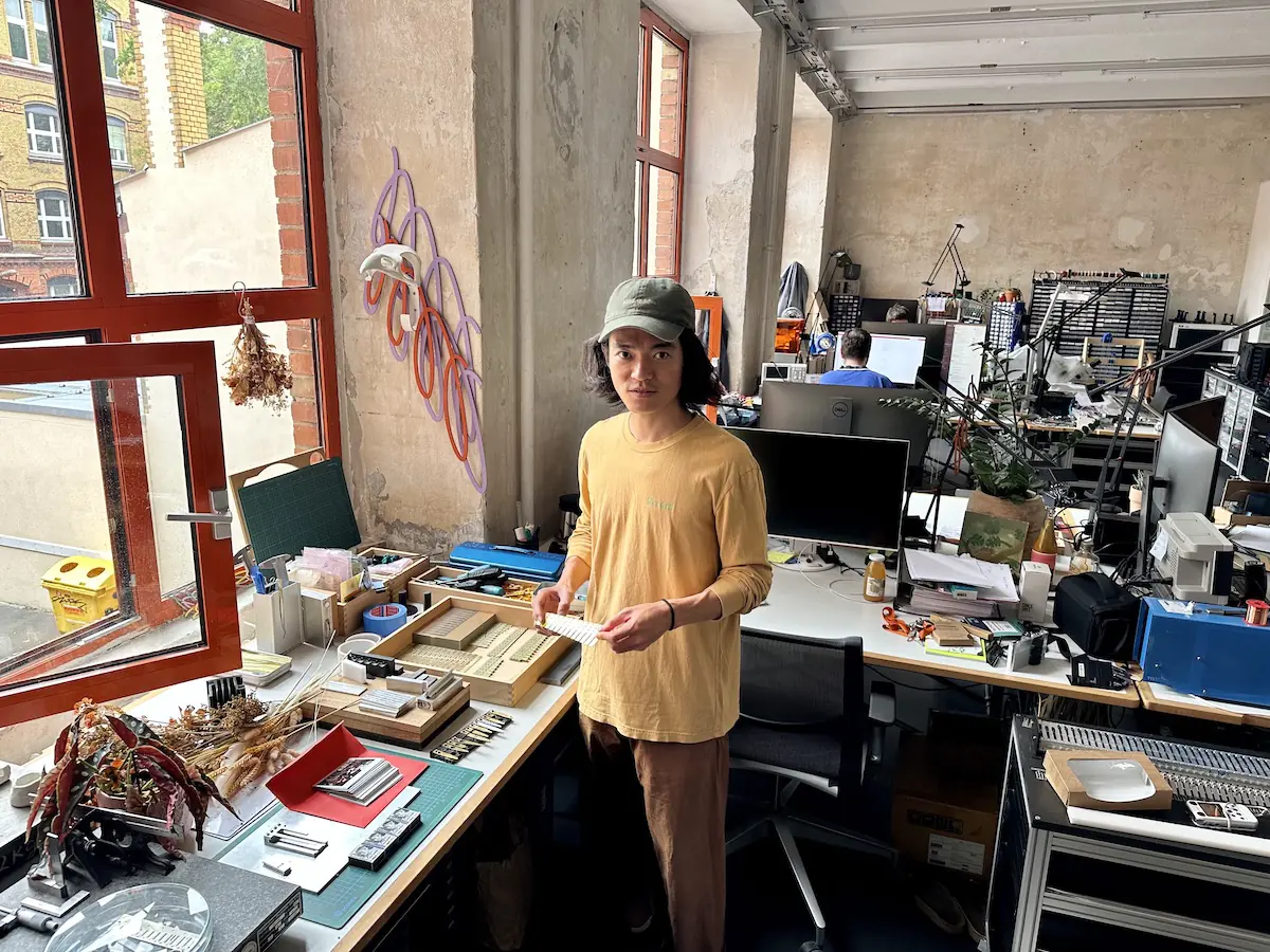Tatsuya Takahashi at his desk, at Korg.Berlin headquarters—developing the Phase5 acoustic synthesizer.